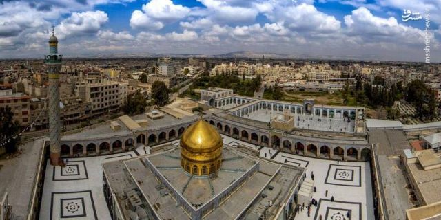 عکس/ توزیع کیک میلاد با سعادت حضرت زینب(س)